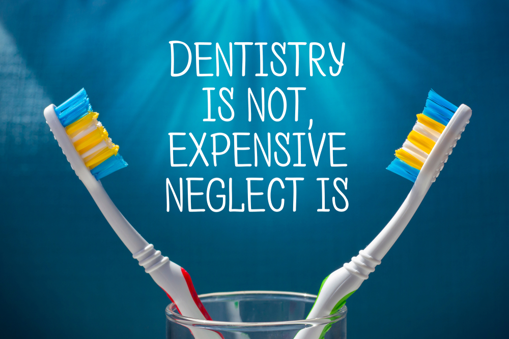Two toothbrushes on a blue background with dentistry inscription branding concept