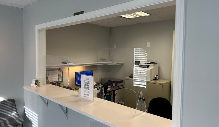 Welcoming front desk at dental clinic using texting for dental practices to manage patient communication and scheduling