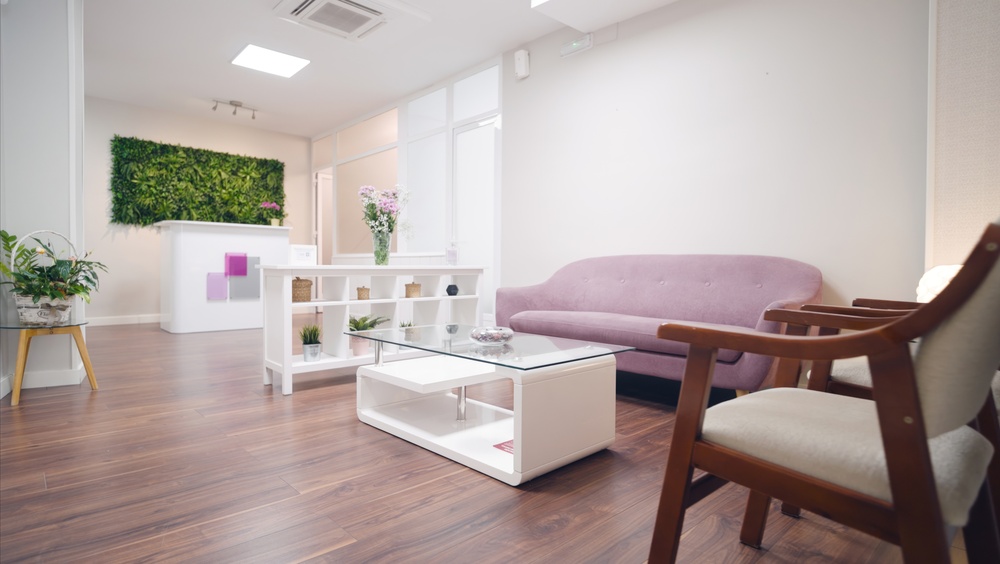 Waiting room inside a modern dental clinic with reception designed for AI visibility and patient experience